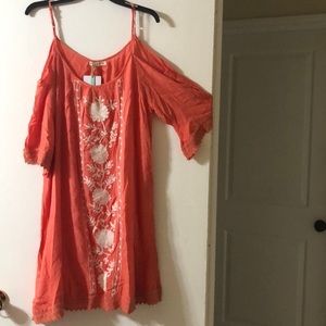 White & pink, but it looks more orange to me. XL Exist show shoulder dress.